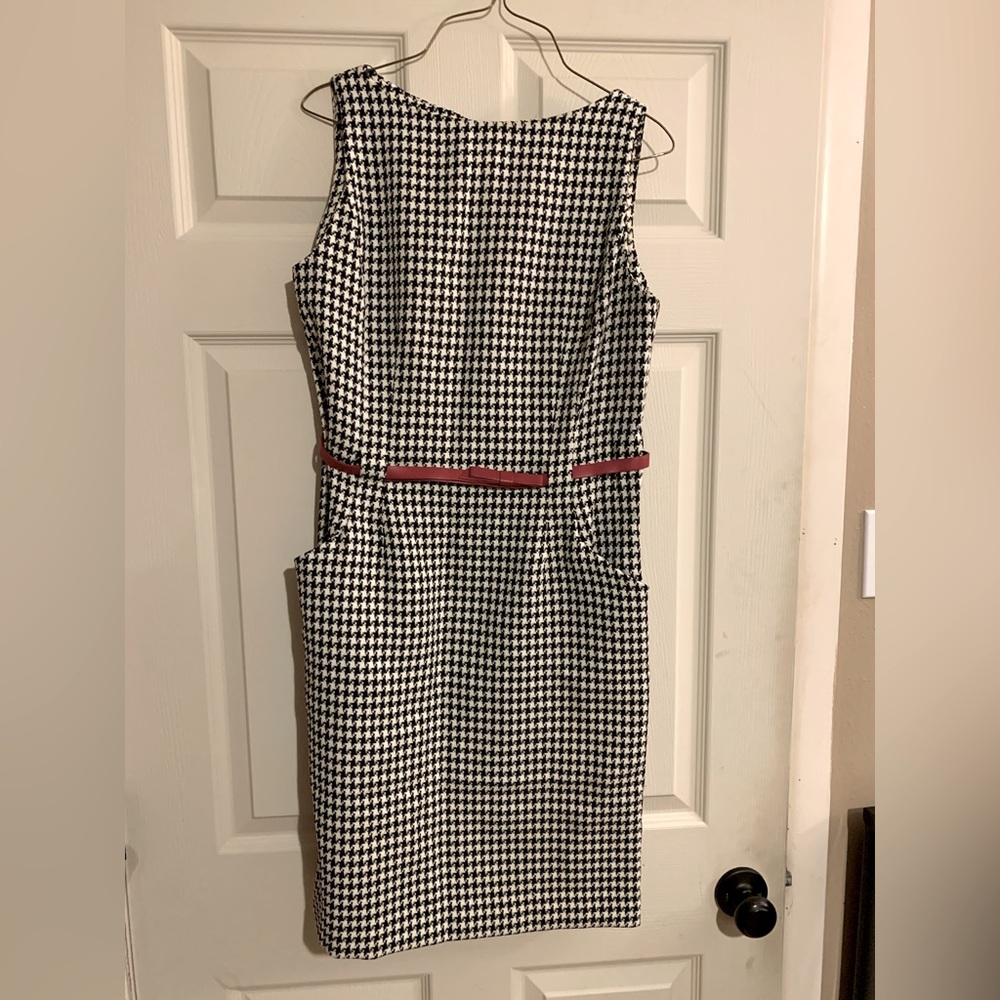 Black and white designed knit dress with red belt
